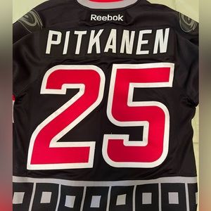 Carolina Hurricanes Joni Pitkanen Black Home Sweater
